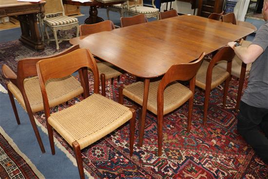 A Danish teak extending dining table designed by Peter Hvidt & Orla Mølgaard Nielsen for France and Daverkosen and ten Dutch manufactur